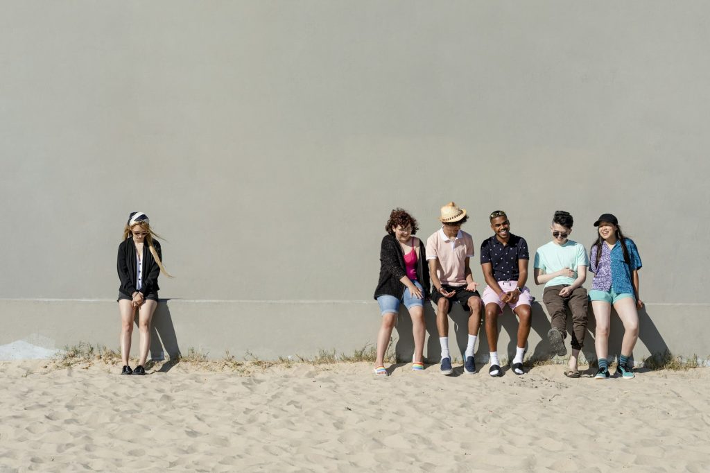 Social exclusion, teenagers bullying a girl