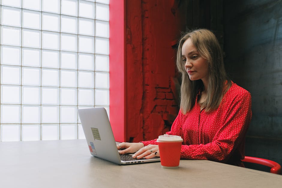 Confident autonomous professional working independently on laptop