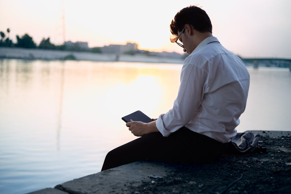 Work-life balance concept with a person leaving the office on time at sunset