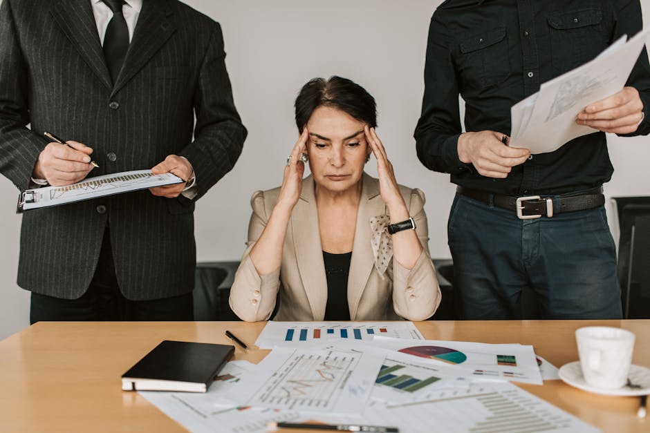 New manager feeling overwhelmed in a modern office