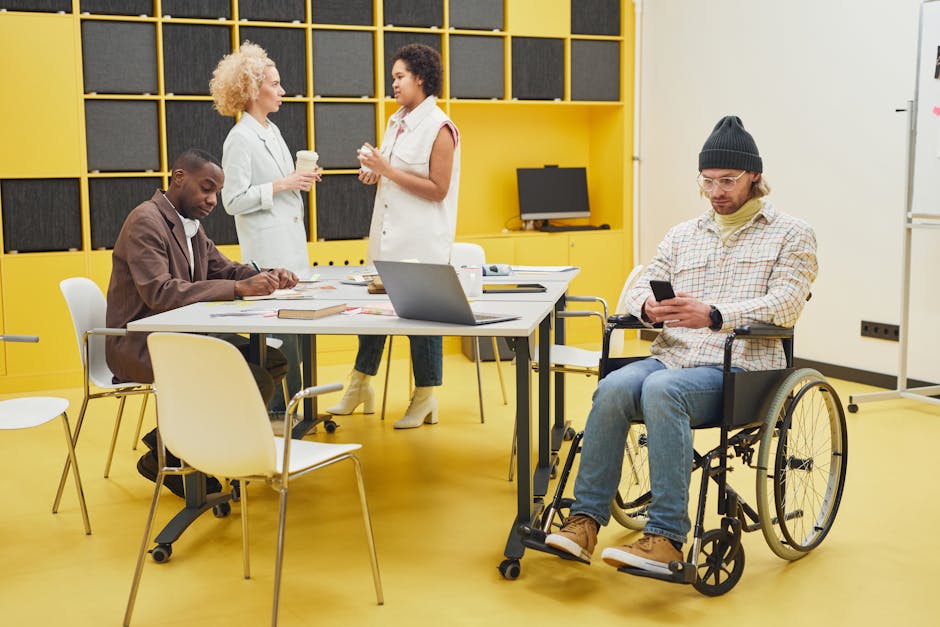 Diverse office team in a meeting, one person interrupted while speaking