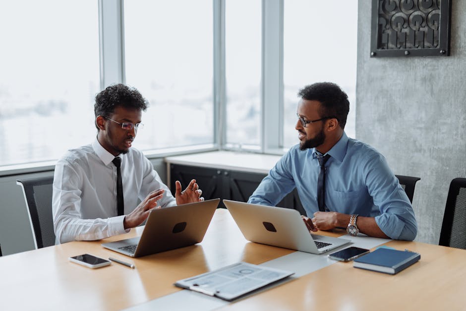 Two colleagues in a calm discussion in a modern office